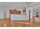 Gourmet kitchen featuring cherry cabinets, granite countertops, and a breakfast bar at 4050 Preserve Crossing Ln, Cumming, GA 30040
