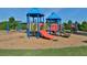 Colorful community playground with slides and swings, providing a fun and safe environment for children at 4050 Preserve Crossing Ln, Cumming, GA 30040