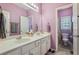 Large bathroom with a double vanity, toilet, and shower at 306 Blake Dr, Canton, GA 30114