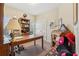 Home office with built-in shelving, desk, and natural light at 306 Blake Dr, Canton, GA 30114