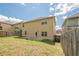 Spacious backyard with a concrete patio and privacy fence, ideal for outdoor living and entertaining at 920 Sublime Trl, Canton, GA 30114