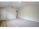 Bright bedroom with a large window, plush carpet, and a closet for ample storage at 920 Sublime Trl, Canton, GA 30114