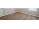 Carpeted bedroom featuring neutral walls, a bright window, and baseboards at 920 Sublime Trl, Canton, GA 30114