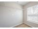 Walk-in closet features a window with neighborhood view and wire shelving at 920 Sublime Trl, Canton, GA 30114