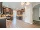Kitchen featuring stainless steel appliances, dark wood cabinets, and hardwood floors at 920 Sublime Trl, Canton, GA 30114