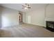 Living room featuring fireplace, neutral carpet, and light gray walls at 920 Sublime Trl, Canton, GA 30114