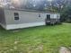 Back of the house with a small deck and slider door at 340 Pat Rich, Canton, GA 30115