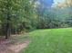 Expansive grassy yard space backed by a scenic wooded backdrop at 340 Pat Rich, Canton, GA 30115