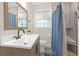 Beautiful bathroom featuring a modern double sink vanity, decorative tile floor, and walk-in shower at 470 Oriole Dr, Marietta, GA 30067