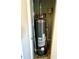 Utility closet featuring a Rheem Performance water heater at 718 Dalvigney Nw St, Atlanta, GA 30318