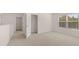 Bedroom with a window and a door leading to a closet at 290 Halibut Cir, Covington, GA 30016