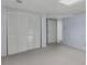 An unfinished basement area features an open floor plan with closet space and neutral walls at 3063 Randolph Ne Rd, Atlanta, GA 30345