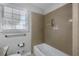 Bathroom featuring shower, vanity, toilet and a window view at 3063 Randolph Ne Rd, Atlanta, GA 30345