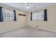 Bedroom featuring carpeted floor and a window view at 3063 Randolph Ne Rd, Atlanta, GA 30345