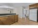 Eat-in kitchen with warm wood cabinets and hardwood floors at 3063 Randolph Ne Rd, Atlanta, GA 30345