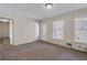 Living room featuring a large door and windows that offer natural light at 3063 Randolph Ne Rd, Atlanta, GA 30345
