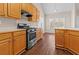 Kitchen featuring stainless steel oven and a great view of the backyard at 3565 Mystic Dr, Buford, GA 30519