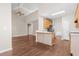 Bright kitchen featuring wood cabinets, stainless steel refrigerator, and hardwood floors at 3565 Mystic Dr, Buford, GA 30519