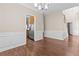 Open-concept floor plan with views into the kitchen and staircase at 3565 Mystic Dr, Buford, GA 30519