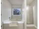 Clean bathroom featuring a soaking tub and a separate shower stall at 17 Cedars Glen Pl, Villa Rica, GA 30180