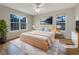 Cozy bedroom with a large window, wood floors and comfortable decor at 17 Cedars Glen Pl, Villa Rica, GA 30180
