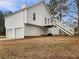 Two car garage and private back deck with stairs make this home ideal for entertaining at 17 Cedars Glen Pl, Villa Rica, GA 30180