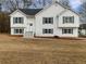 Charming white two-story home with blue shutters and well-maintained front yard at 17 Cedars Glen Pl, Villa Rica, GA 30180