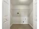 A laundry room features washer and dryer hookups, and closet doors at 17 Cedars Glen Pl, Villa Rica, GA 30180