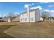 Expansive backyard featuring lush green space, perfect for outdoor activities and relaxation at 2612 Kirkhill Ct, Lawrenceville, GA 30044