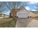 Charming single Gathering home with an attached garage and well-manicured lawn at 2612 Kirkhill Ct, Lawrenceville, GA 30044