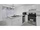 Modern kitchen with a stainless steel range, dishwasher and a double basin sink at 2612 Kirkhill Ct, Lawrenceville, GA 30044