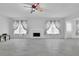 Bright and airy living room features tile floors, fireplace, and lots of natural light at 2612 Kirkhill Ct, Lawrenceville, GA 30044