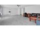 Open-concept living room with tile flooring and seamless transition to the kitchen area at 2612 Kirkhill Ct, Lawrenceville, GA 30044