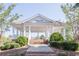 Elegant gazebo with a white frame, brick base, and surrounding green shrubs in Central Park at 1279 Lakeside Overlook, Canton, GA 30114