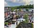 Aerial view of a vibrant outdoor event with people gathered near a building with an upper deck at 1279 Lakeside Overlook, Canton, GA 30114