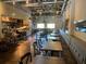Inviting restaurant interior featuring tables and chairs set for service in a spacious dining area at 1279 Lakeside Overlook, Canton, GA 30114