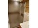 Bathroom with glass shower doors and floating shelves at 1931 Harvest Way, Loganville, GA 30052