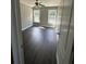 Bedroom with gray walls, ceiling fan, and natural light from windows at 1931 Harvest Way, Loganville, GA 30052