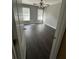 Bedroom with ceiling fan and natural light pouring in from two windows at 1931 Harvest Way, Loganville, GA 30052