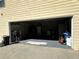 Spacious garage with plenty of storage room for vehicles and tools at 1931 Harvest Way, Loganville, GA 30052