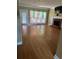 Bright living room with fireplace and access to the deck at 1931 Harvest Way, Loganville, GA 30052