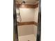 Tiled shower with a shower head and built in rack at 1931 Harvest Way, Loganville, GA 30052