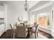 Breakfast area featuring a round table, seating for four, chandelier and bright bay windows at 2600 Peachtree Nw Rd # 10, Atlanta, GA 30305