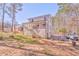 The backyard has ample space and mature trees for shade at 2738 Allyn Nw Way, Kennesaw, GA 30152