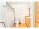This full bathroom has a shower and wooden cabinets at 2738 Allyn Nw Way, Kennesaw, GA 30152