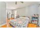 Comfortable bedroom featuring hardwood floors, natural light, and ample storage at 2738 Allyn Nw Way, Kennesaw, GA 30152