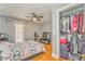 Cozy bedroom with ceiling fan, hardwood floors and closet storage space at 2738 Allyn Nw Way, Kennesaw, GA 30152