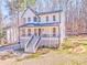 Charming two-story home with a covered porch and an inviting entrance at 2738 Allyn Nw Way, Kennesaw, GA 30152