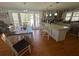 Dining table and granite island in open kitchen, great for entertaining at 2738 Allyn Nw Way, Kennesaw, GA 30152