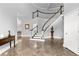 Bright foyer with a grand staircase and marble floors at 3670 River Mansion Dr, Peachtree Corners, GA 30096